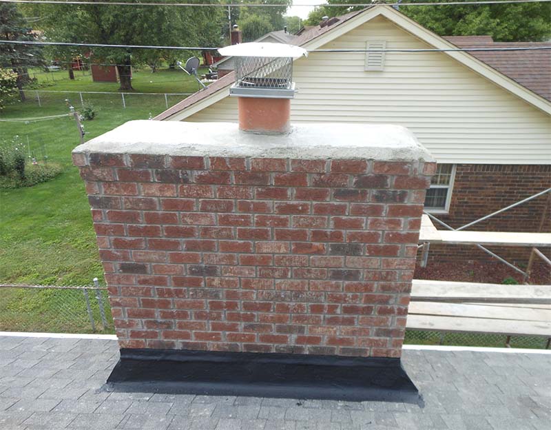 Mad Hatter - Original image of Project A chimney afterr red brick chimney with new chase cover